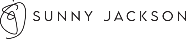 Sunny Jackson woman smiling outdoors in natural light.